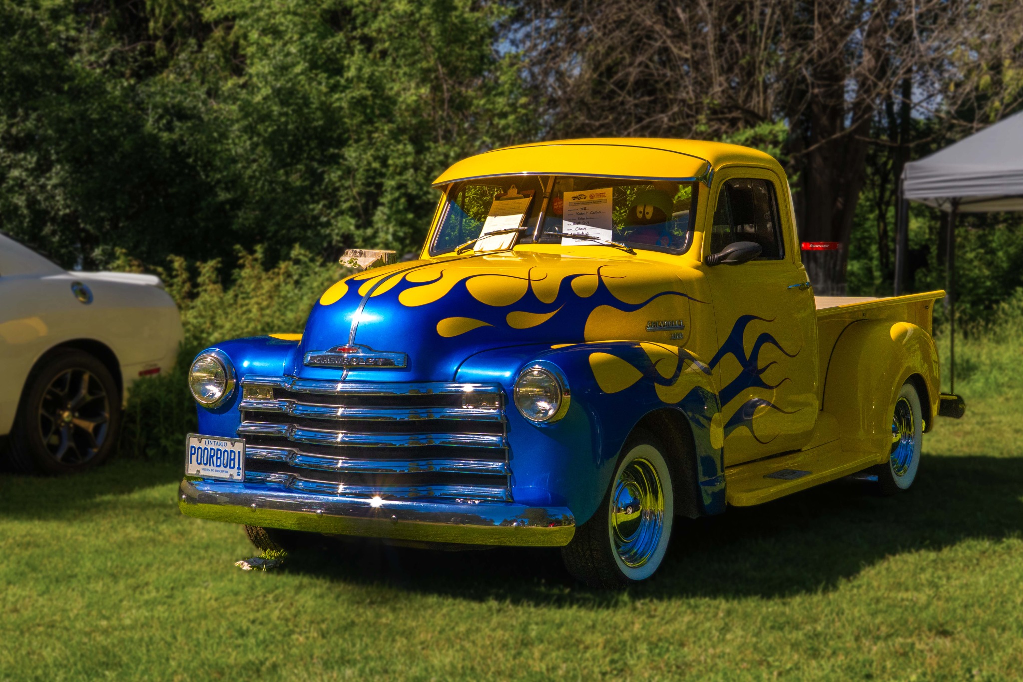 Yellow and blue custom Chevrolet pickup truck at the Father’s Day Car Show